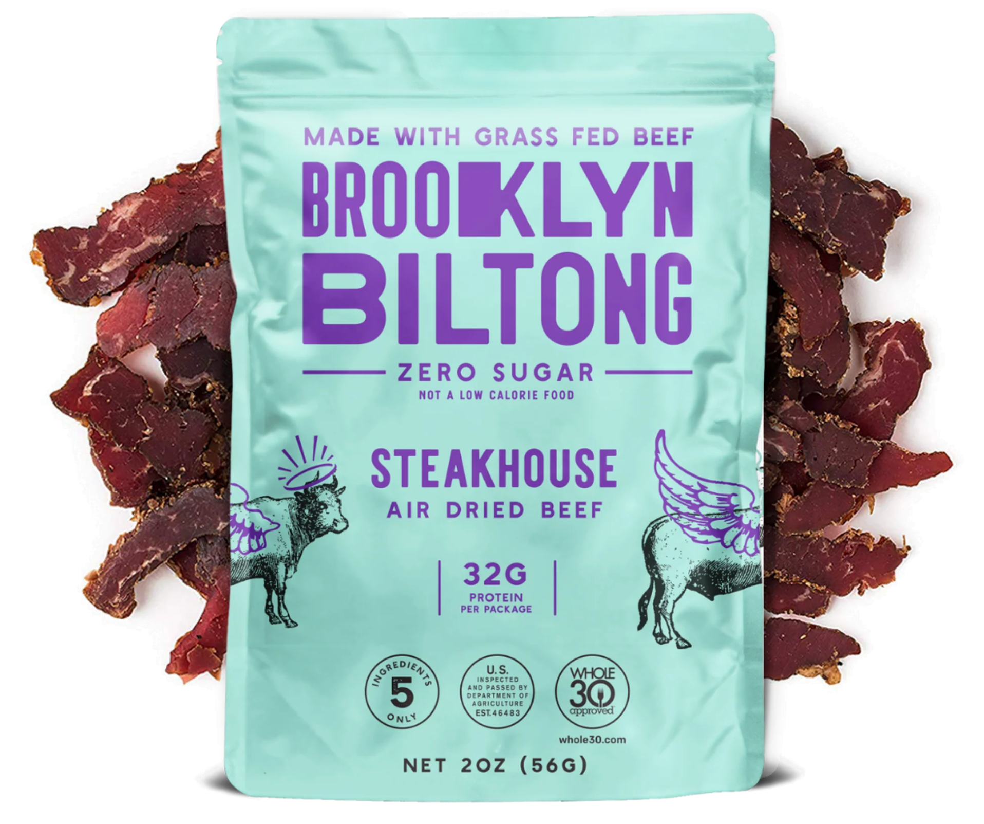A bag of Brooklyn Biltong Steakhouse Flavor made with grass-fed beef, featuring a mint-green package with purple text, surrounded by thin slices of air-dried beef.
