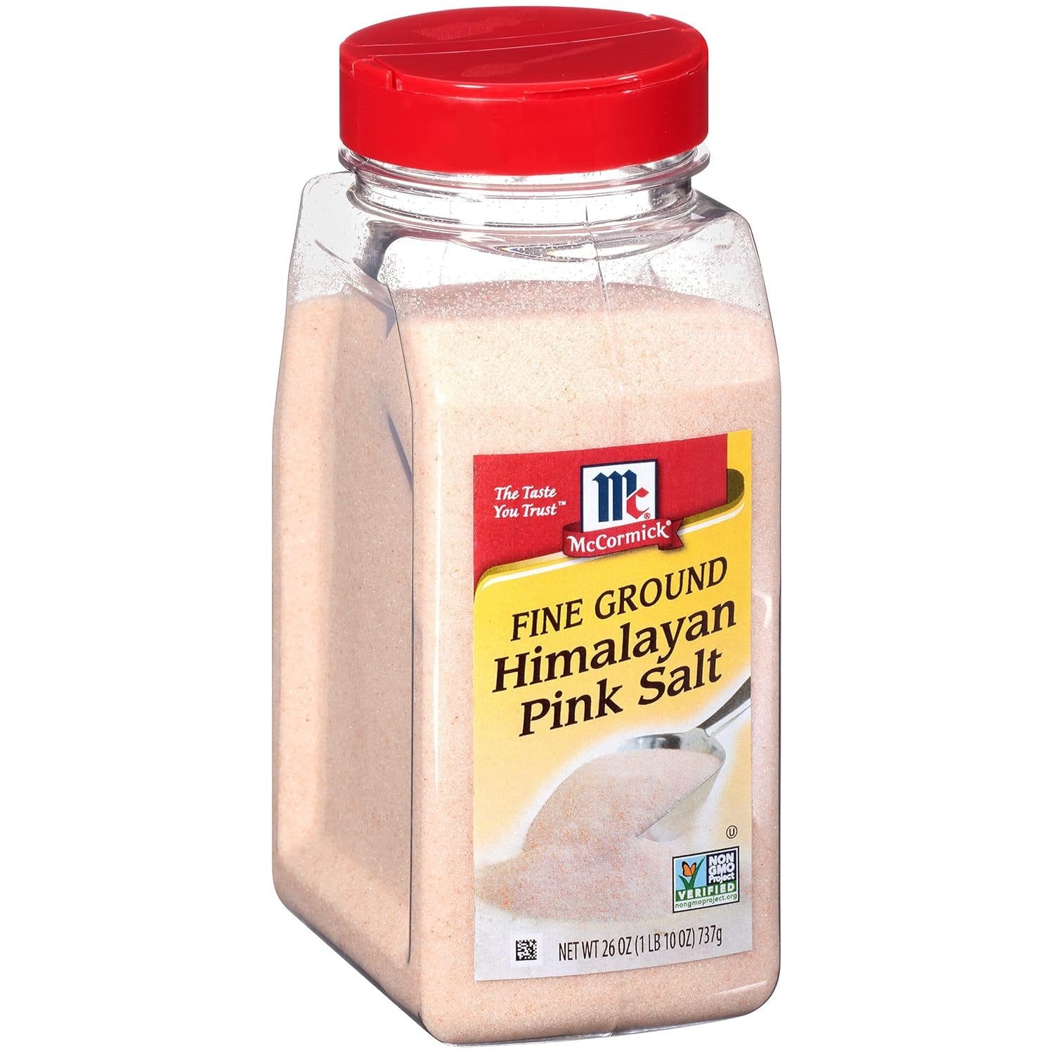 A clear plastic container of McCormick Fine Ground Himalayan Pink Salt with a red cap, featuring a label that highlights "The Taste You Trust" and a Non-GMO Project Verified seal. The net weight is 26 oz (737 g).