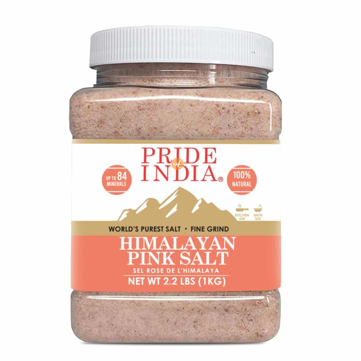 A 2.2 lbs (1 kg) jar of Pride of India Himalayan Pink Salt, fine grind, 100% natural, containing up to 84 minerals. Suitable for both kitchen and bath use.
