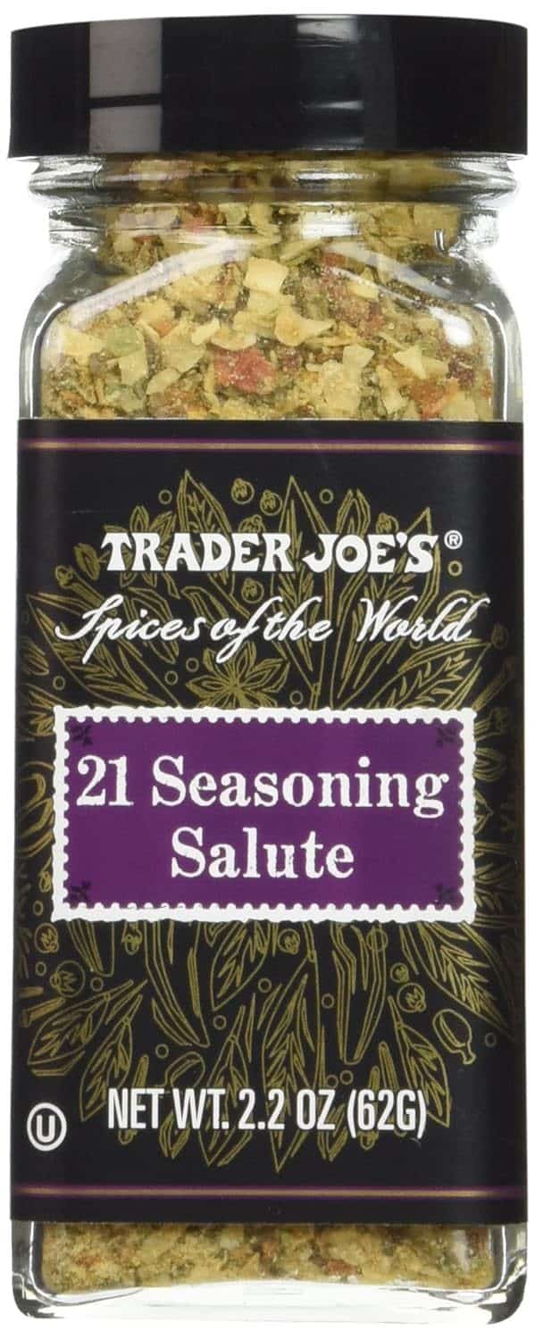 A bottle of Trader Joe's 21 Seasoning Salute, a salt-free spice blend featuring 21 herbs and spices for versatile cooking and seasoning.